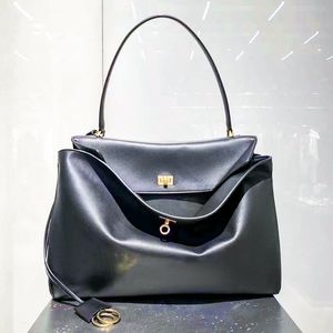 Designer di alta qualità a manico top the tote bag womens modalità traversa di luxurys borse frizione borse da rodeo maschile da viaggio in pelle ad alta capacità