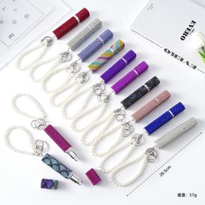 Keychains Woman Designer Key Chain Accessories Teckyings cheios de diamante Dispensador Bottle Bottle Compact Essence Keychain Portable com a tecla de spray de prensa anéis 02