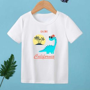 T-Shirts Yeni Stil Serin Dinozor Keyifli Yaz Çocuk T-Shirt Kız Beach Sunset Baskılı T-Shirt Boy Plaj Dinozor Giyim Çocuk Hediye Topl240509