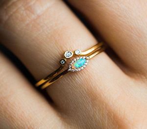 USA: s storlek 5 6 7 8 av 2 st Bröllopsförlovningsring Set Guldfärg Söt härlig Opal Stone Eye CZ Tunna små ringar5683636