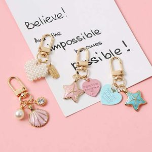 Keychains Lanyards Ly Cute Imitated Pearls Heart Sea Star Keychain Metal Shell Pendant Car Key Ring Women Headset Case Pernament Accessories J240509