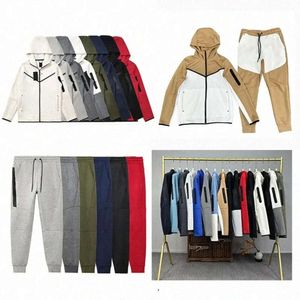 2024 Designer di tuta da pista pantaloni da uomo con cappuccio pieno zip windrunner giacca sportiva giuntura riflettente con cavo tascabile tascabile tisping tech pile 66