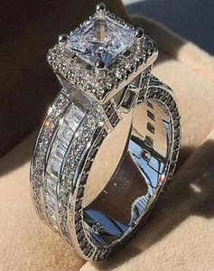 Anéis femininos exclusivos Jóias Princesa Cut Alloy Whie CZ Diamond Party Eternity Women Weaking Band Ring Presente 20226078353