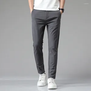 Męskie spodnie Summer Koreańskie klasyczne mężczyzn Casual Blue Black Grey Brand Spodni cienki rozciąganie Slim Elastyczna talia jogger streetwear