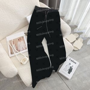 Pantaloni di lettere affollati CEL SCEED CAPRIS Pantaloni in vita elastica Donestro di pantaloni in vita alta