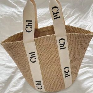 Woody Straw Designer Raffias Shop Beach Bag Womens Luxurys handväska Summer virkning Korgen Tygväskan Weave Cho001