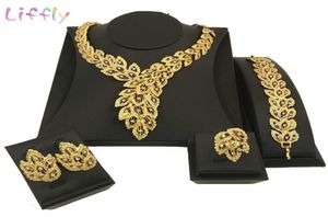 Liffly dubai brud smyckesuppsättningar för kvinnor påfågel guldhalsband örhängen mode charm afrikanska bröllop nigeria set smycken 201123647729