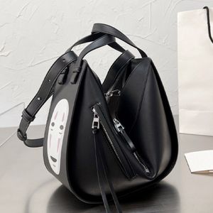 Designer Women Bag Bagpack Handväskor Kvinnliga ansiktslösa mäns stora kapacitet Tecknad spirat bort ryggsäck Enkel axelväska 235 år