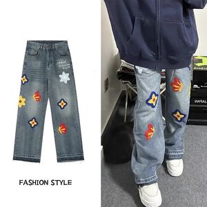 Street Creative Letter Vintage Petal Embroidered Jeans WoMAN Spring and Autumn Loose Straight Leg Wide Leg Washed Denim Pants 240509