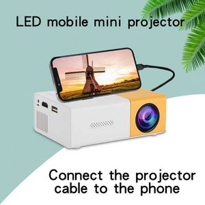 Projectores YG300 Mini Projector LED Plug Connection Adequado para telefones celulares Home Theatres ao ar livre de entretenimento em casa presentes de aniversário J240509