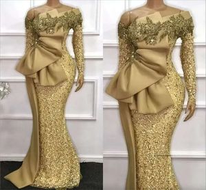 Złote afrykańskie sukienki wieczorne syreny błyszczące cekinowe długie rękawy Big Bow Satin Peplum PROM PROM GOWNS Plus Size Arabic Aso Ebi Ebi Women Vestidos de Festa 0509