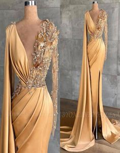 Gold Yellow Prom Evening Dresses Deep V Neck Sheer Long Sleeve Pärled Crystals Luxury Party Celebrity Gowns BC94696021180