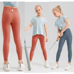 Lululemo Leggings höchste Qualität 24Ss Girls Yoga Leggings Kinder dünne Strumpfhosen Jogginghosen weiche elastische Sportarten enge Hose Kinder tanzen dünne Hosen 839