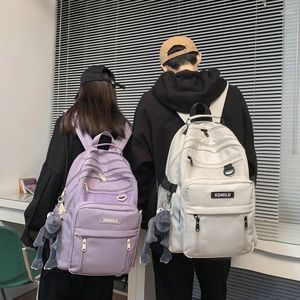 Mochila designer masculino e feminino mochilas de nylon tecidos à prova d'água sacos de computadores de marca de viagem Lazer