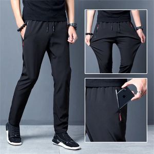 Mens Casual Long Pants Plus Size Sweatpants Summer Cool Stretch Male Black Grey Thin Loose Quickdry Sport Joggers 240422