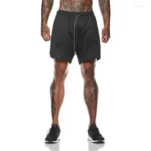 メンズショーツダブルレイヤーソリッドカラー大規模フィットネススポーツトレーニングクイック乾燥ジョギングパンツ