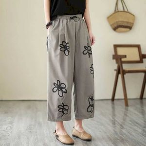 Frauenhose Capris Hosen Blume Graffiti Design elastischer Taille Lose lässige Vintage Koreanische Modehose Harem Hosen Strtwear Frauen Kleidung Y240509