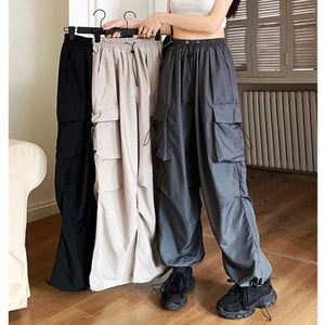 Calças femininas Capris y2k strtwear calças de cargo larga de perna larga casual lisado bolsos grandes jogando pistas de moletom retro coreanas Mulheres 2023 Y240509