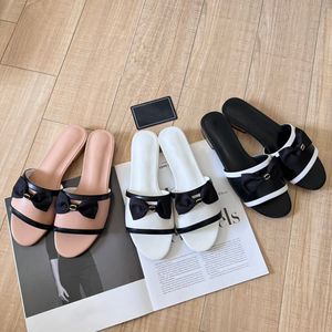 2024 designer slide bow slippers women geranium men designer sandals high quality fashion slipper famous brand mens and womens sandals flats sandal