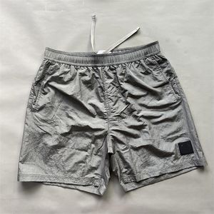 Designer da Europa Classic Moda Men shorts solto encaixe rápido secagem metal nylon tingido shorts ao ar livre esportes casuais 5 pontos Swim de praia unissex calças SI