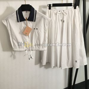 Frauen langer Rock ärmelloses geschnittener Top -Buchstaben bestickter Hemdblusen Designer Elastiziert Taillenröcke