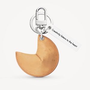 Último relevo unissex key carteira de luxo letra biscoito bolsa de ombro de bolsa de ombro de chaves de letra pingente designer clássico feminino 214u