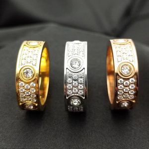 2022 Nuovo lusso a 3 fili Diamond Love Ring Coppia di moda Crystal Fedi nuziali Designer per uomini Donne di alta qualità 316L Titanio Steel 284n