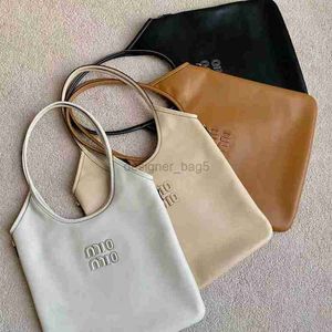 7A Mirror Quality Designer Bag Spring/Summer Ny Tote Underarm Bag Hidden Bag Cowhide Lightweight Shopping Bag One Shoulder Stor kapacitet Pendlare Solid Women's Bag