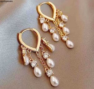 Stud ny modetrend unik design elegant delikat ljus lyxig pärla tofs örhängen höga smycken party gynnar för kvinnor 7677