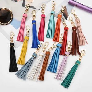 Keychains Lanyards Leather bag pendant colored PU leather tassel keychain womens school bag womens clothing decoration J240509