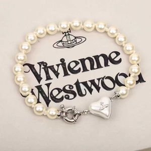 Designer High Version Westwood Trumpe Love Love Saturn Pearl Bracelet feminino Design de pêssego resina de pêssego