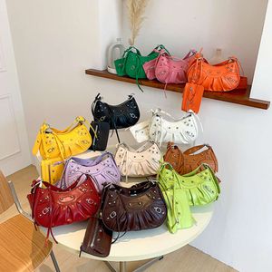 New Underarm Bag 2024 New Fashion Women Pleated Crescent Female Shoulder Bag Classic Vintage Riveted Motorcycle Bag