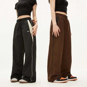 Spodnie damskie Capris 2024 Women Speisure Jogger Technologia solidne serce w talii przeciąganie szerokiej kieszonki Y2K Street odzież Extra duże sporty Q240508