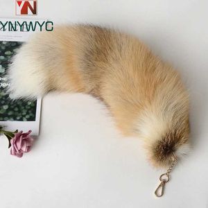 Keychains Lanyards 2024 New Fox Tail Keychain Wolf Schwanzfell Quasten Bag Etikett Schwarz und brauner Pom Charme Keychain Bracket Str -Kette Geschenk J240509