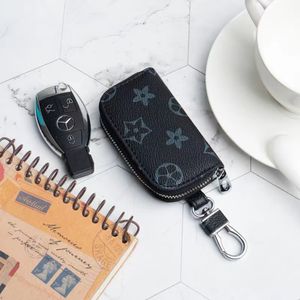 Designer Men Universal Car Key Bags Case Unisex Manlig äkta Leather Key's Holder Women Zipper Smart KeyChain Case Cars Keys POUC 237Q