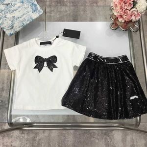 Brand girls dress Summer baby tracksuits kids designer clothes Size 90-150 CM Bow decorated T-shirt and shiny sequin short skirt 24May
