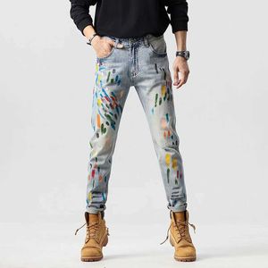 Męskie dżinsy lekkie luksusowe modne marka graffiti dżinsy High-end trend szczupły proste retro spersonalizowane swobodne Q240509