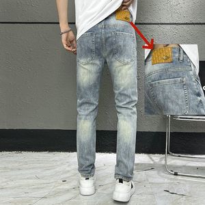 Jeans masculinos Primavera Verão CDICON MEN LEIR LONA LONO FID FITA AMERICANO AMERICANO MARCA DE LOUTA PENTES PEQUENAS LIRAS LXK32-9