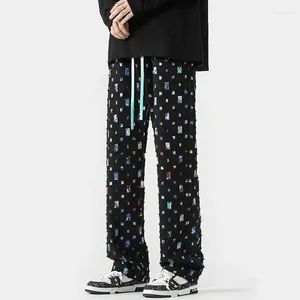 Herrbyxor svart vita rutiga män mode retro ihålig ut lös rak harajuku streetwear hip-hop casual man joggar m-5xl