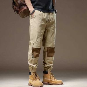 Męskie spodnie zszyte top męskie High Street kontrastujący kolor mody 2024 Letni trend w pełni dopasowany kostki Casual Pantsl2405