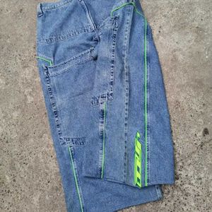 Męskie dżinsy JNCO wzór hip -hopowy retro zielony pasek duży kieszeń luźne gotyckie szerokie spodnie nóg deskorolka Y2K Street moda Q240509