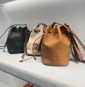 High quality Designer MIUI bucket bag cross body bag Luxury women's bag fashion shoulder bag Leather bag Linen bag Large capacity bag Summer bag 16*24CM