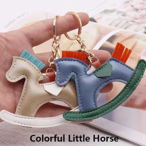 Keychains Lanyards Leather Horse Keychain 2024 Cartoon Pony Animal Cute Womens Bag Charming Shake Horse Pendant Keychain J240509