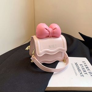 Spring New Korean Mini Children's and Girls' Shoulder with Bow Chain Crossbody Small Parent Child Women's Bag 78% factory wholesale