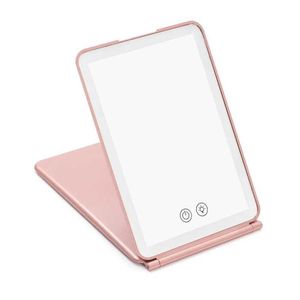 Kompakta speglar Ny makeupspegel med LED -ljus för kvinnor Portable Foldble Dressing Desktop Stand Travel and Home Use Table Q240509