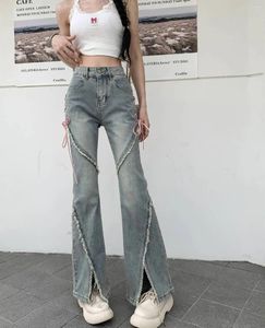 Kvinnors jeans amerikanska delade kvinnor rosa bandage hög midja oregelbunden skarvad denim byxor blixtlåsbyxor y2k pantalon femme