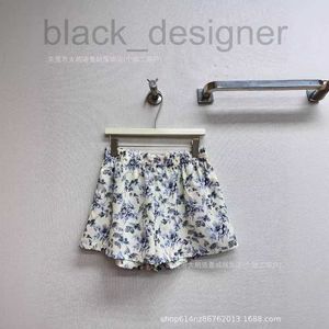 Skirts designer 24 Summer New Sweet Vacation Style Fragmented Flower Half Skirt Super Western Small Cake Design BSW3