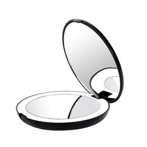 Компактные зеркала Портативное складное зеркало со светодиодным светодиодом макияж 10x увеличительное стекло 12 шариков мини -черный Q240509