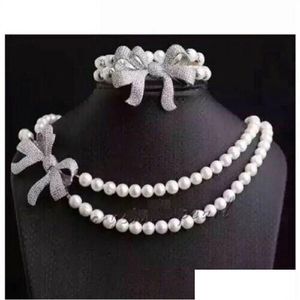 Collane di perline 2 file AAA 78mm Akoya White Pearl Necklace Bracciale da 18 pollici 758 Beautif Buckle Anello 240106 Gioielli con consegna a goccia penna dhqa7