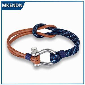 Charm Armband Hot Sale Fashion Jewelry Navy Style Sport Camping Parachute Cord Survival Armband Män Kvinnor med rostfritt stål Shackle Buckle Y240510